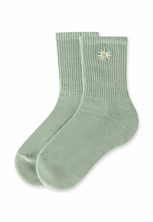 Pair of light green ribbed socks with a small embroidered white and yellow daisy near the top cuff.