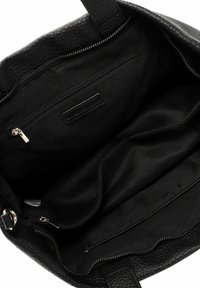 Black leather tote bag featuring a textured exterior, a spacious interior with fabric lining, and a zippered pocket for organization.