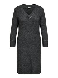 Mörkgrå långärmad stickad klänning med V-ringning och små dekorativa nitar längs kragen och ärmslut.