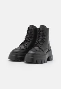 Nubikk Botines con plataforma - black