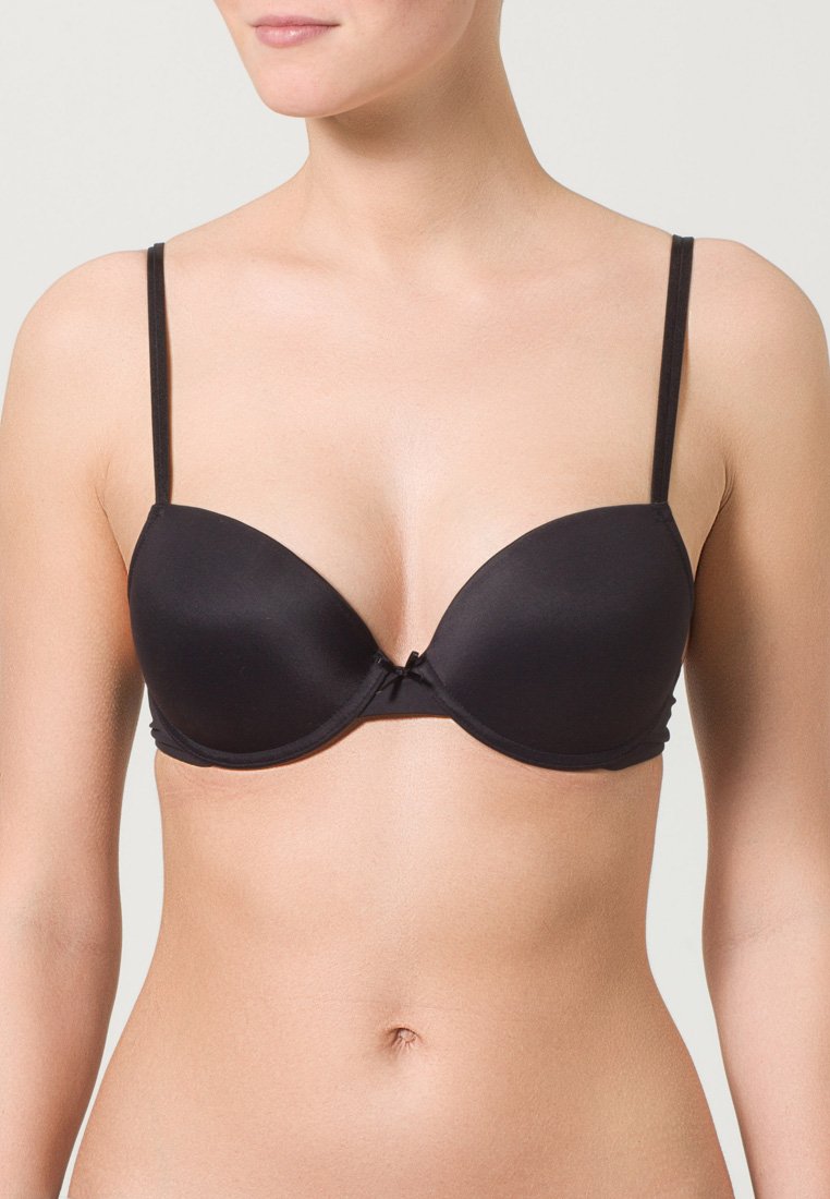 Black padded bra with adjustable thin straps, smooth fabric, plunge neckline, small bow detail at the center, and seamless cups.