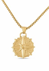 Pendente a forma di bussola in oro con un design dettagliato a stella, bordi testurizzati e una superficie liscia, abbinato a una catena intrecciata in oro.