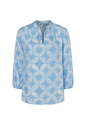 Hellblaue Bluse mit lockerem Schnitt, versehen mit einem weißen Kreis-Muster, 3/4-Ärmeln mit elastischen Bündchen und einem kleinen V-Ausschnitt.
