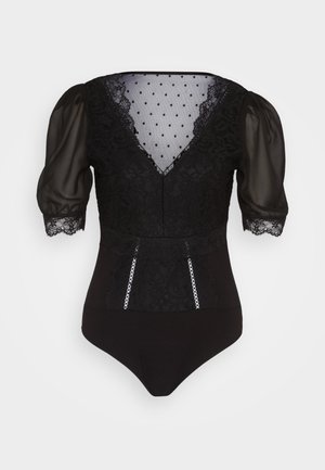 Body nero con maniche a sbuffo trasparenti, dettagli in pizzo, rete a pois sul corpetto e rifiniture decorative lungo la parte anteriore.