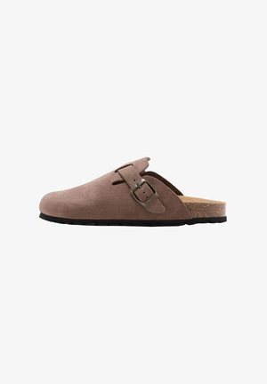 Brown suede slip-on clog with adjustable side buckle and cork footbed on black rubber sole, shown from left side.