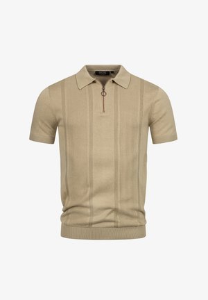 Polo shirt a maniche corte in maglia beige con righe verticali texture e una zip a metà in marrone con un cursore circolare.