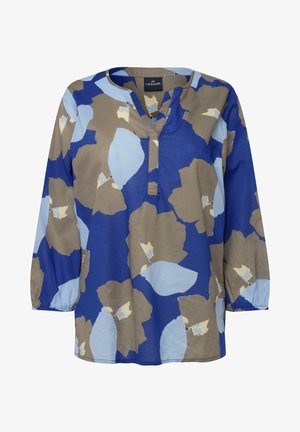 Tunic floreale blu con grandi motivi beige e azzurri. Materiale in cotone, maniche lunghe, scollatura a V e un design rilassato.