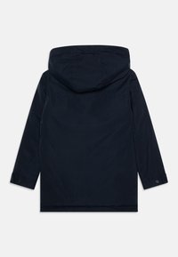 Navy blue jacket with a hood, featuring long sleeves and buttoned cuffs. Smooth fabric with a straight cut and no visible pockets.