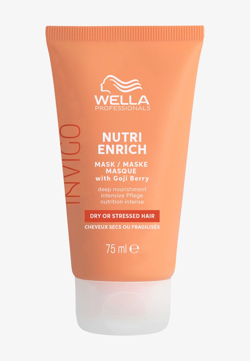 Tube orange avec un bouchon flip-top, étiqueté "MASQUE NUTRI ENRICH" et "avec Baie de Goji", conçu pour les cheveux secs ou stressés, 75 ml.