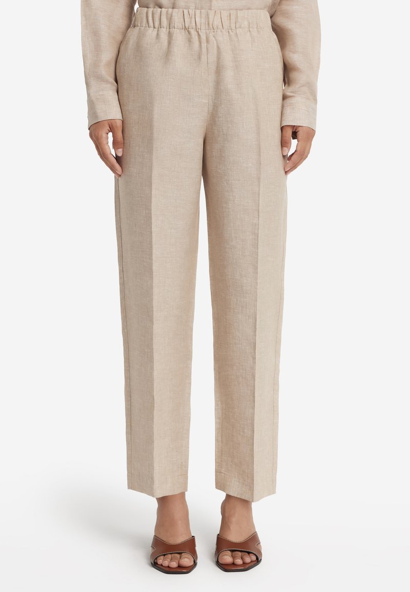 Beige linnedbukser med en afslappet pasform, der har en elastisk talje, lige ben og sidesømme for ekstra struktur.