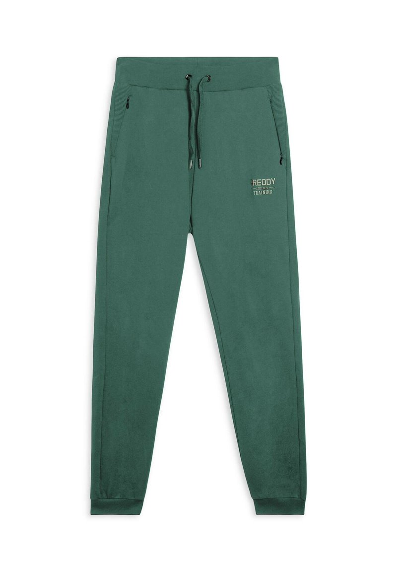 Pantaloni joggers in pile verde con cintura elastica, cordino, tasche laterali con zip e logo stampato sulla coscia sinistra.