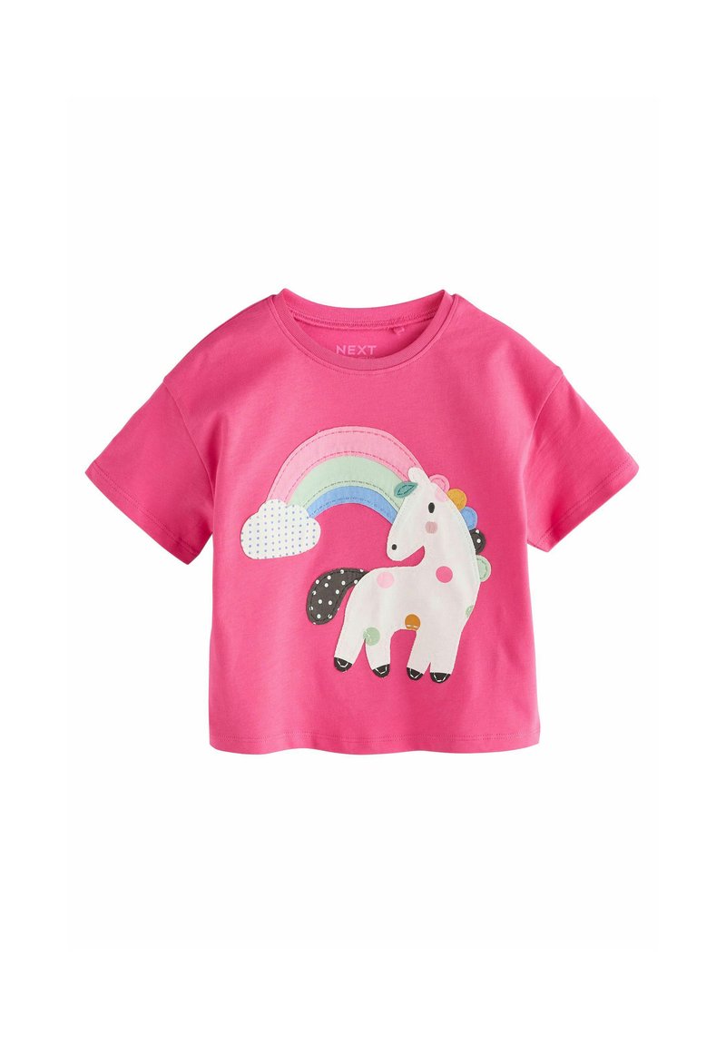 Rosa Baumwoll-T-Shirt mit einem Einhorn-Motiv, das mit Punkten und einem Regenbogen verziert ist. Kurzärmlig und mit Rundhalsausschnitt. Maschinenwaschbar.