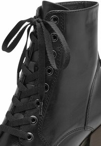 Tamaris Kotníkové boty na platformě - black leather