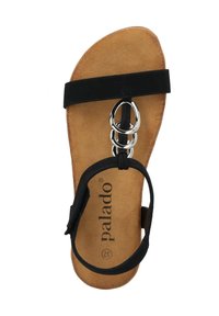 Sandal nero con suola piatta, caratterizzato da due cinturini neri e dettagli circolari in argento. Soletta morbida in tan con il marchio "palado".