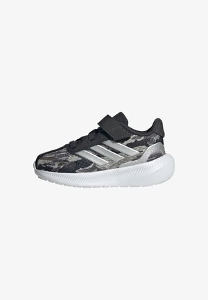 Black and gray camouflage sneakers with silver accents, lightweight design, Velcro strap, padded ankle, and textured white outsole.