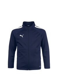 Marineblaues Zip-Jackett mit hohem Kragen, weißen Seitenstreifen, zwei Fronttaschen und Puma-Logo in Weiß oben links. Glattes Gewebe.