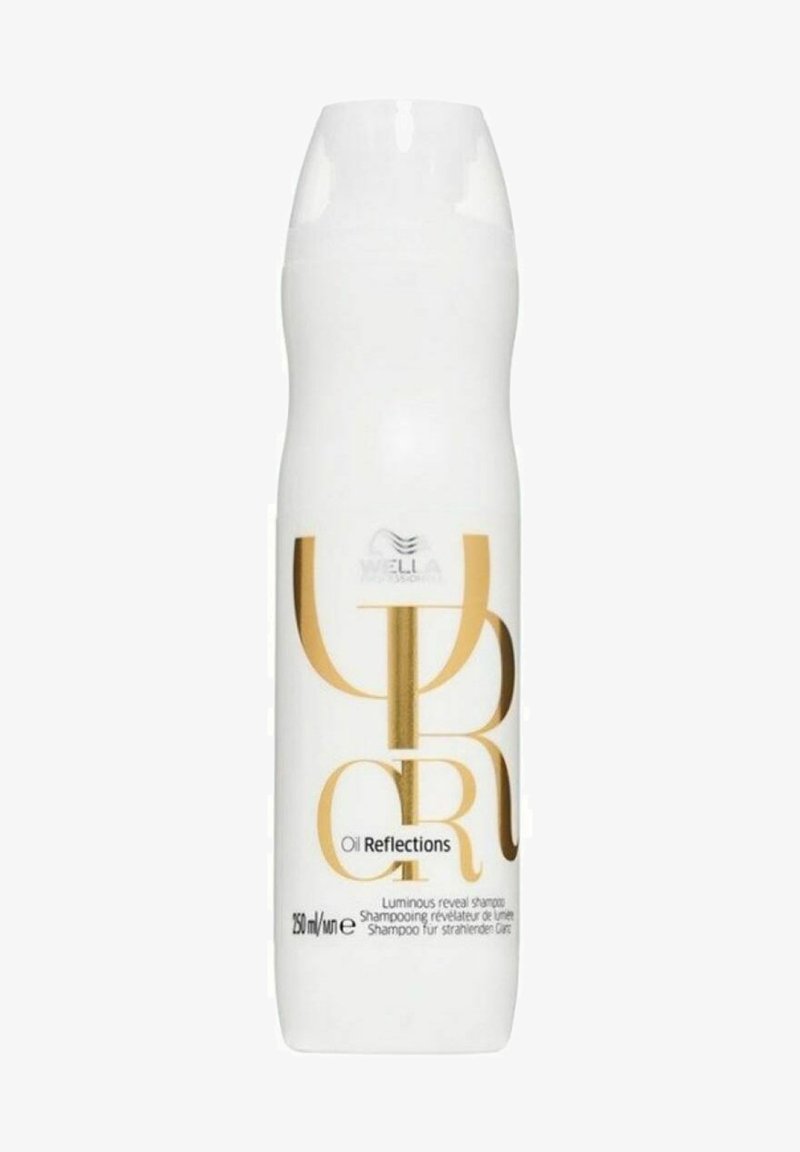 Witte shampoo fles met gouden accenten. De tekst bevat "Oil Reflections" en "Luminous reveal shampoo." Inhoud: 250 ml. Gladde textuur.