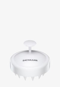Weißer Kopfhautmassager mit einem glatten, runden Design und einem zentralen Griff. Verfügt über sechs kurze Zinken für sanfte Stimulation. Markenname sichtbar.