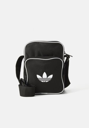 ADICOLOR UNISEX - Cross body bag - black/white