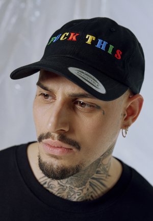 Black baseball cap with multicolored embroidered text reading "F*** THIS." Adjustable strap, cotton fabric, structured design.