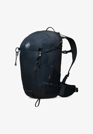 Zaino con un design blu navy e nero, caratterizzato da texture in tessuto, spallacci regolabili e una tasca anteriore con zip.