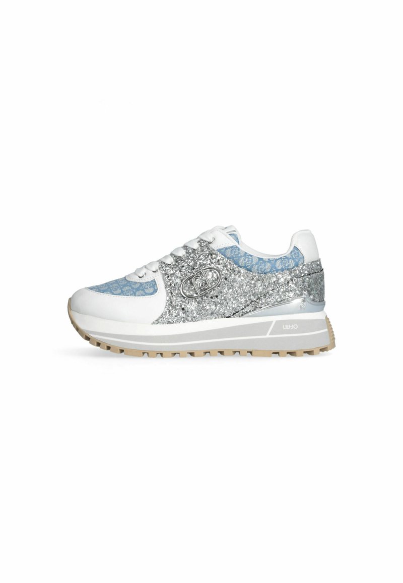 Sneakers featuring a white base with blue accents and a silver glitter overlay. Textured fabric and rubber sole with a patterned design.