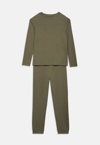 Λαδί μακρυμάνικο τοπ με στρογγυλή λαιμόκοψη και μανίκια ραγκλάν, σε συνδυασμό με στενά παντελόνια που ταιριάζουν, με ελαστικές μανσέτες.