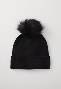 Berretto lavorato a maglia nero con una trama a coste e un soffice pompon nero sulla parte superiore. Il risvolto è ripiegato, conferendogli una forma compatta.