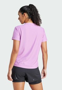 adidas Performance TEE - Sport T-shirt - preloved purple