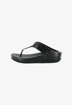 Sandalo infradito con zeppa in pelle nera, con plantare imbottito e ampia fascia sul collo del piede, su sfondo bianco.