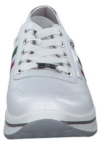 White leather sneaker with colorful stripes in green and pink. Features metallic accents, round toe, and textured sole with lace-up design.