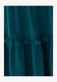 Sélectionné, teal