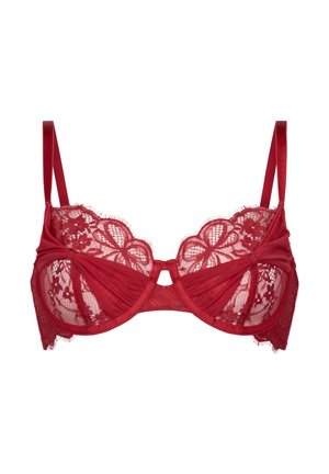 Reggiseno rosso in pizzo con ferretto, caratterizzato da motivi floreali, coppe trasparenti e morbide bretelle in raso. Include un dettaglio centrale ritagliato.