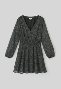 Robe noire à manches longues bouffantes, décolleté en V et taille élastique. Présente un motif à pois blancs dispersés. Tissu léger.