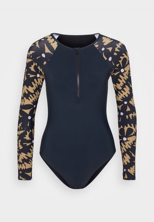 Long-sleeve wetsuit with a dark navy body, patterned sleeves in gold and black, featuring a front zipper and a fitted design.