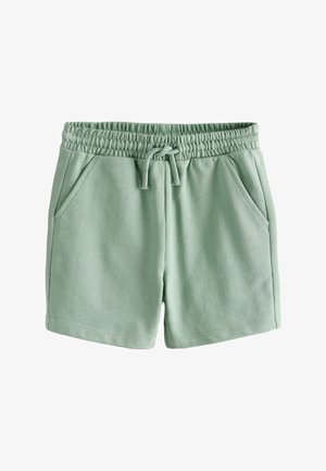 Zöld pamut rövidnadrág elasztikus derékpánttal, zsinórral és két oldalzsebbel. Puha textúrájú és egyszerű, egyenes szabású.