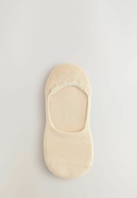 Beige bomullssocka med låg skärning, med en slät yta och stretchig ribbning runt öppningen för en säker passform.