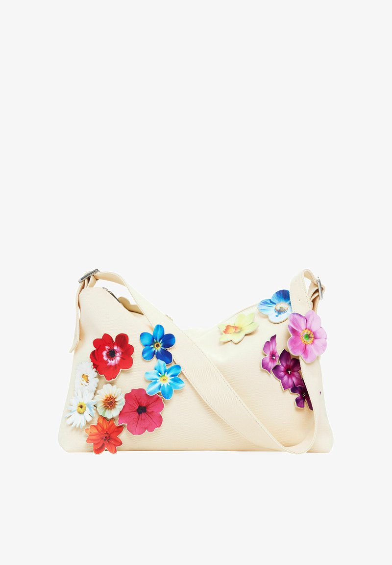 Cream-colored handbag with a floral design featuring multi-colored flower appliqués. Shoulder strap and smooth fabric texture.