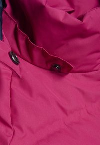 Fuchsia padded jacket fabric with a smooth texture, featuring black button accents and a collar, showcasing a soft, warm lining.