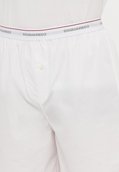 Weiße Baumwollshorts mit einem grauen und roten, mit DSQUARED2 gebrandeten Gummibund. Mit einem einzelnen Knopfverschluss und weicher Textur.