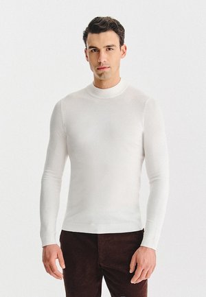 - Sweter