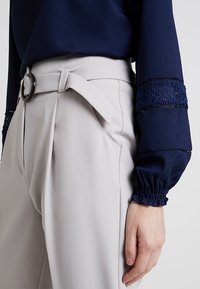 Anna Field Pusero - dark blue