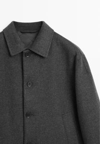 Gray wool coat with a traditional collar, featuring four black buttons, and a side pocket. Soft texture and tailored design.