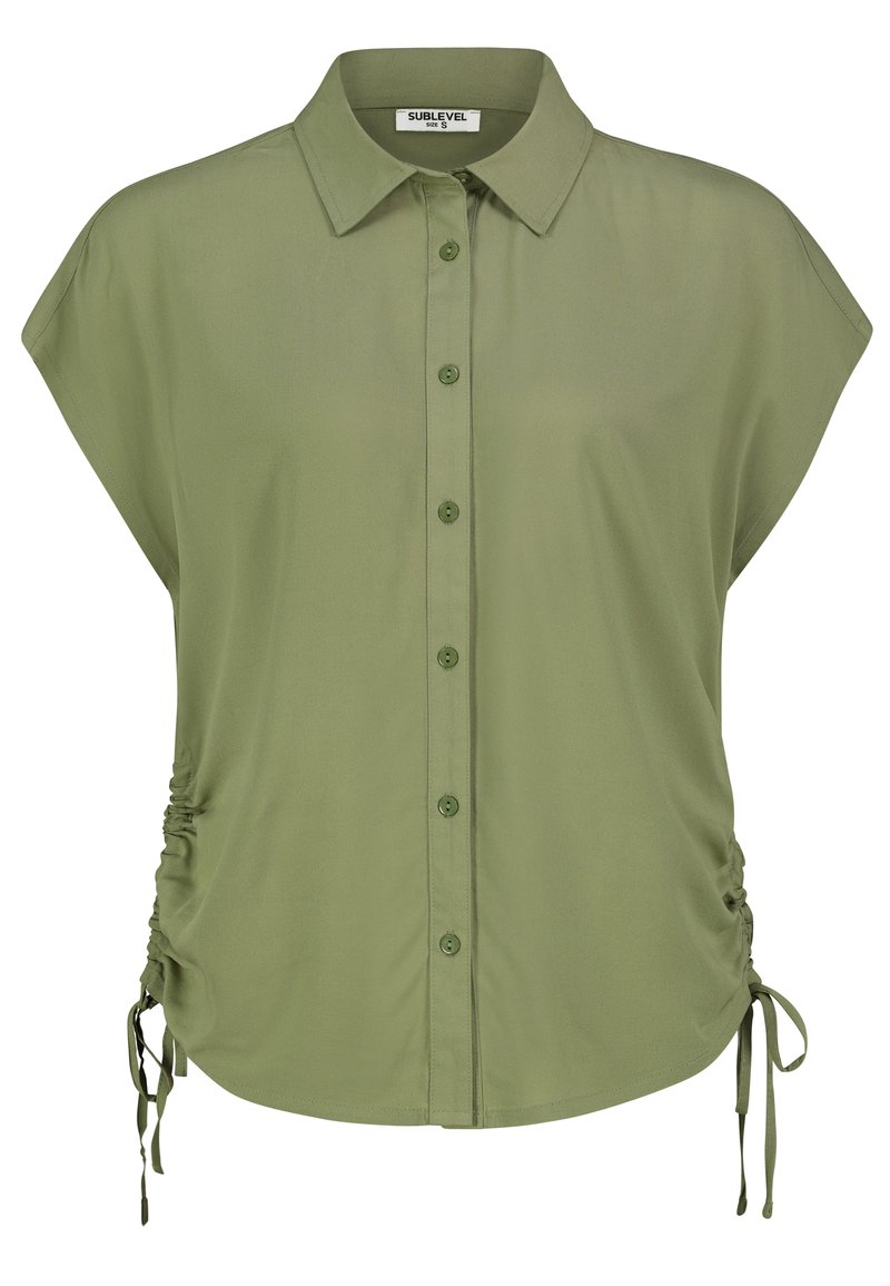 Short-sleeve olive green shirt with a collared neckline, button front, and gathered side seams featuring adjustable ties. Soft, smooth fabric.