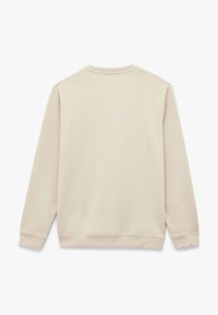 Krämfärgad sweatshirt med slät yta, långa ärmar och rundad halsringning. Har en enkel baksida med avslappnad passform och ribbade avslut.