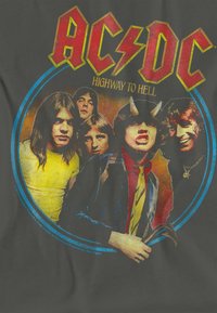 Black T-shirt featuring a graphic print of five men, vibrant colors with blue circle and red accents, titled "AC/DC Highway to Hell."