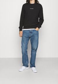 Weekday Džíny Straight Fit - blue
