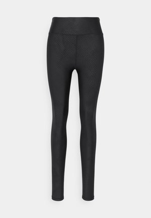 Black leggings with a high waistband, featuring a textured pattern. Made from a stretchy material for comfort and flexibility.