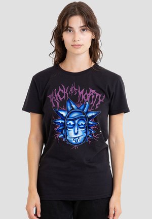 Young woman with long brown hair wearing a black T-shirt featuring a blue stylized Rick face and purple "Rick and Morty" text.