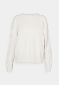 Sweter w kolorze kremowym, wykonany z miękkiego materiału, z okrągłym dekoltem, opadającymi ramionami oraz prążkowanymi mankietami i dołem. Luźny krój.